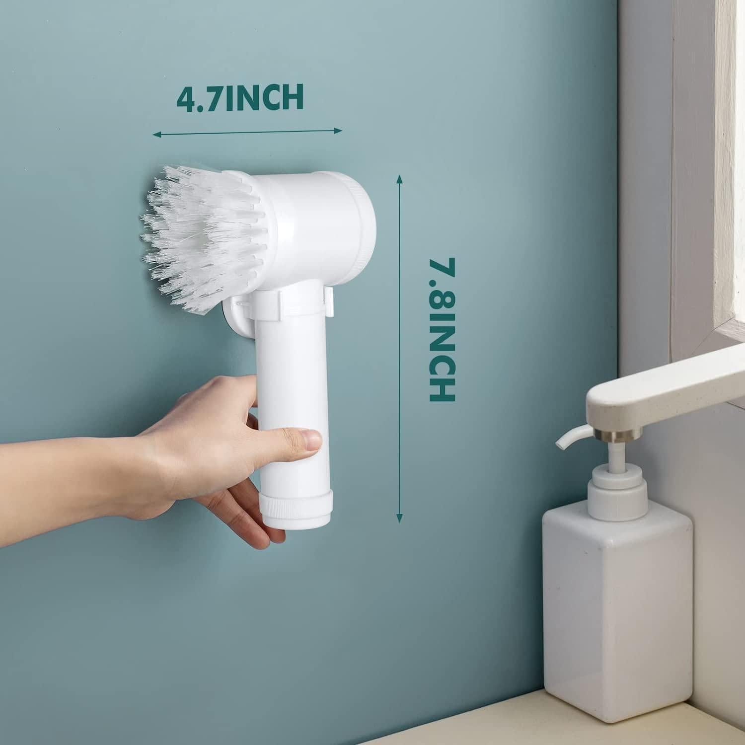 The white handheld cleaning brush shown on the wall with measurements mentiond as - 4.7 Inches width and 7.8 inches height